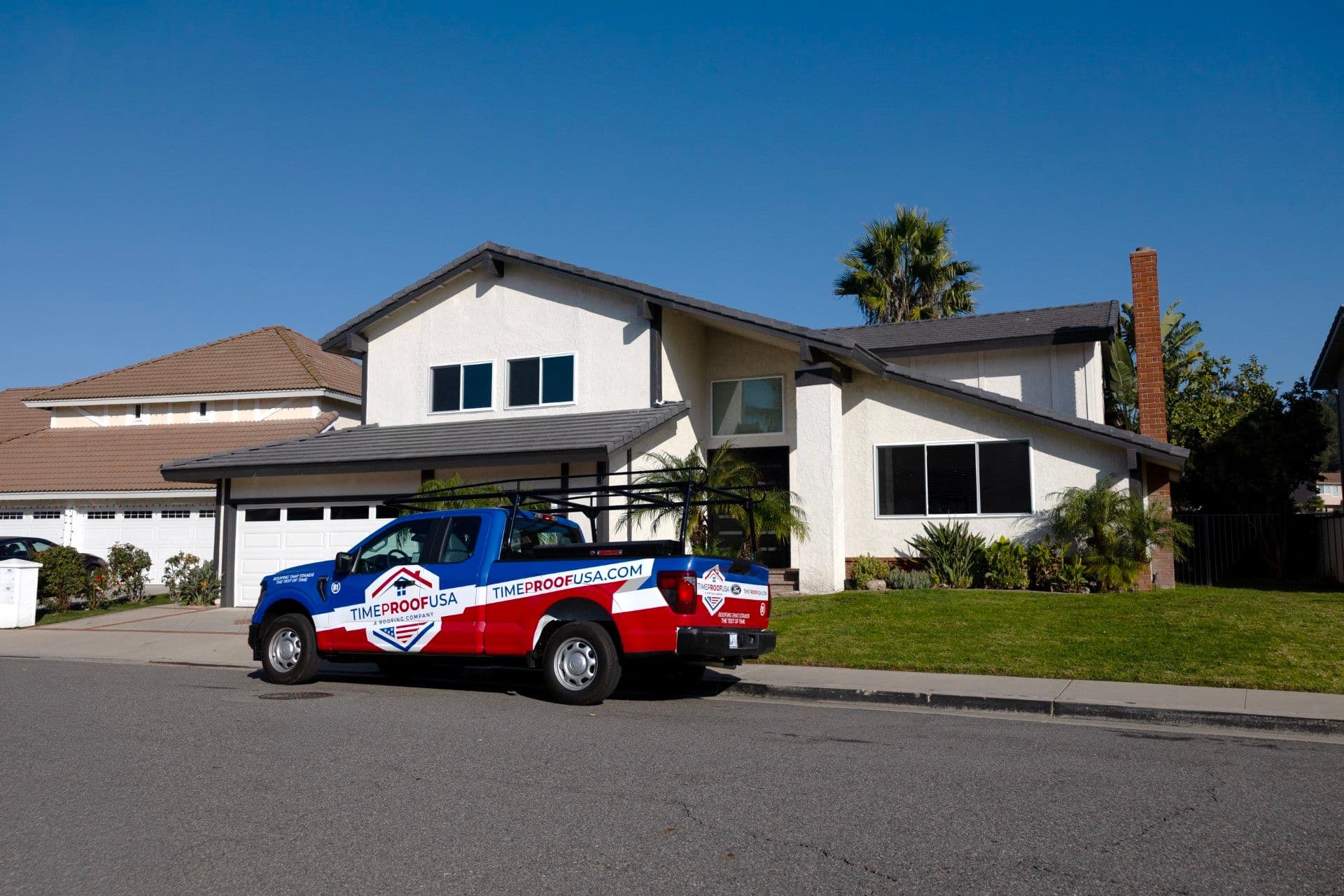 Timeproof Truck in front of a home