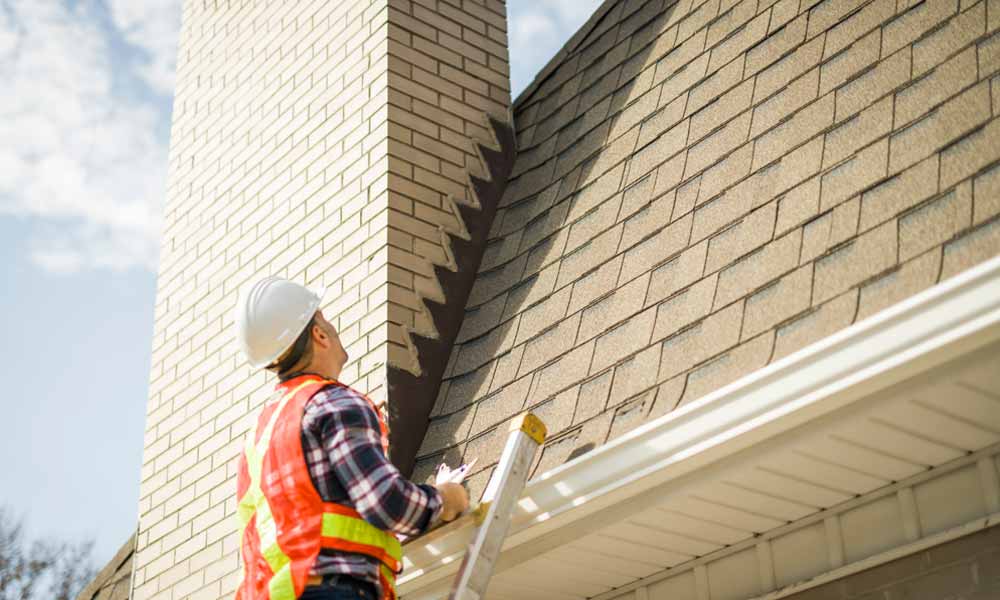 Construction worker speaking on phone